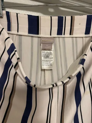 CHICO’S Stylish wide-leg pants in a navy and white striped pattern. Lightweight, flowy fabric for all-day comfort. Versatile design that dresses up or down. Easy to pair with tops and sandals. thumbnail 7