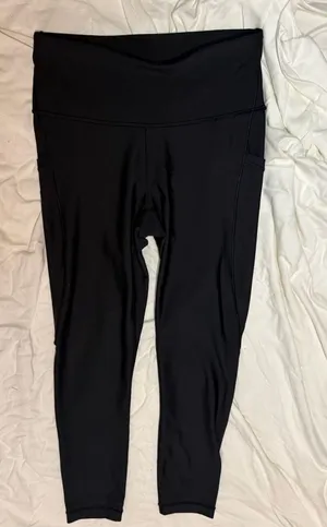 Athleta leggings, size S, black, with pocket and logo detail thumbnail 1