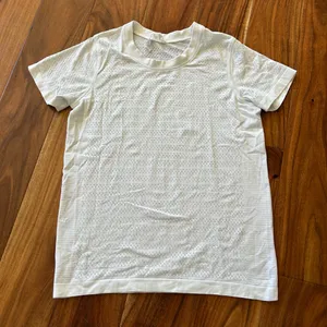 Lululemon Breeze By Short Sleeve Top in White thumbnail 2