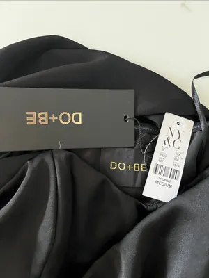 DO+BE black satin jumpsuit featuring an asymmetrical draped one-shoulder overlay thumbnail 2
