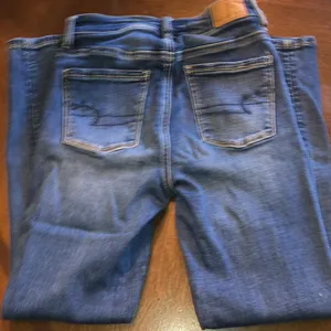 Size 0 Short American Eagle Stretchy Blue Distressed Skinny Jeans thumbnail 4