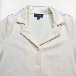Pastel yellow collared button thumbnail 3