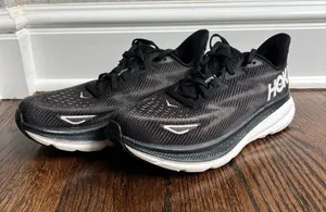 Hoka Black and White Athletic Running Shoes thumbnail 1