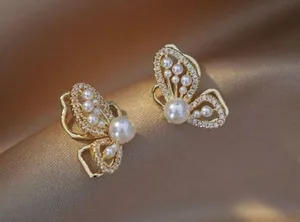 White pearl butterfly stud earrings for women thumbnail 3