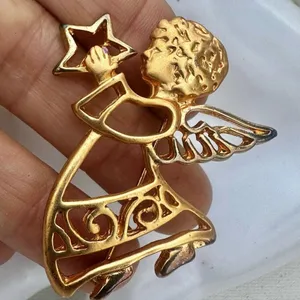 Gold tone angel holding star brooch thumbnail 5