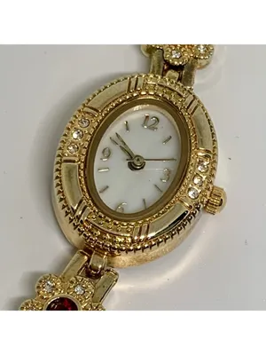 Allude gold tone women’s watch red stones 19mm floral links up to 7.5” running thumbnail 3