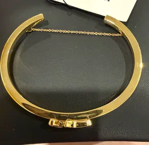 COACH | Gold Plated Traditional Horse & Carriage Logo Cuff Bracelet | Medium thumbnail 1