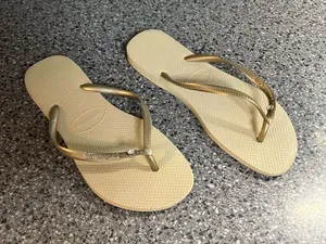 Havaianas Women’s Slim Flip Flops - Beige Footbed with Gold Straps thumbnail 1