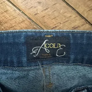 Agolde dark wash distressed stretchy Chloe low rise 24 jeans thumbnail 4