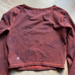 Lululemon Wunder Train Cropped Long Sleeve Shirt Orange Larkspur Size 4 thumbnail 6