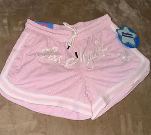 pastel pink mesh athletic shorts from Blue Riot XO. thumbnail 1