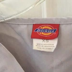 FINAL MARKDOWN Ladies’ Dickies Scrub Top (XS) thumbnail 3