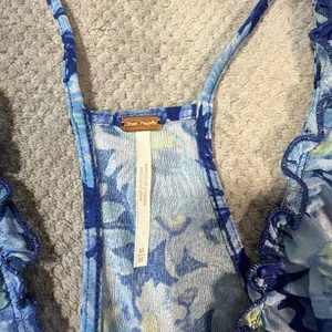 Free People Fearless Tank Blouse Blue Floral Ruffle Tie Front Sheer Peplum Med # thumbnail 3