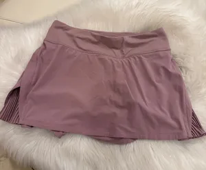 lululemon athletica mauve pleated side-panel mini skirt thumbnail 1