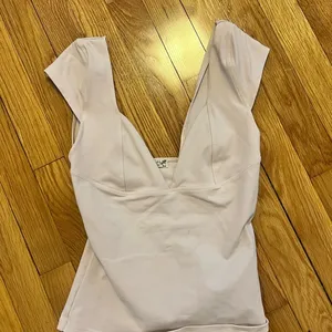 V-Neck Sleeveless Top in Light Beige thumbnail 1