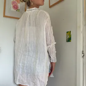 White linen button up shirt with ruffle collar and long sleeves #linen #summer thumbnail 3