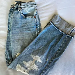 RE/DONE 90s blue high rise loose distressed jeans thumbnail 1