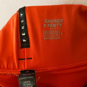 Savage X Fenty Sport Orange Biker Shorts Workout Women's size 12 / 14 Large thumbnail 2