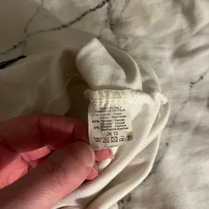 Brandy Melville White Cross-Back Crop Top thumbnail 5