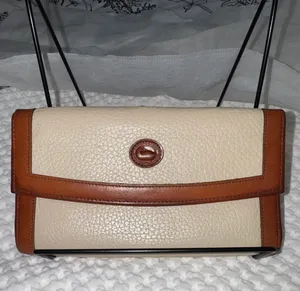 Vintage Dooney & Bourke Cream Pebbled Leather Clutch with Tan Trim thumbnail 1