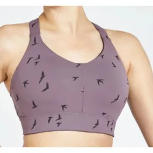 Oiselle purple sports "QUEEN bra" soaring bird silhouette print. Size 4 thumbnail 1