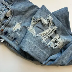 American Eagle Outfitters • Light Wash Destructed Mom Jeans thumbnail 2