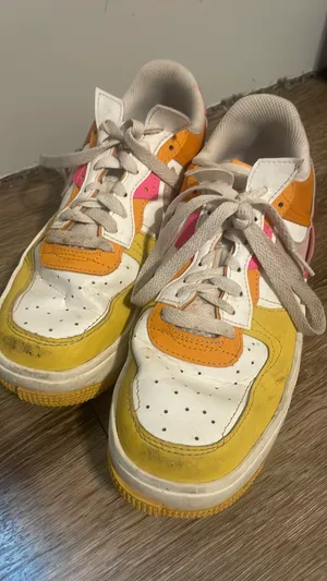 Pink orange and yellow Nike shoes thumbnail 3