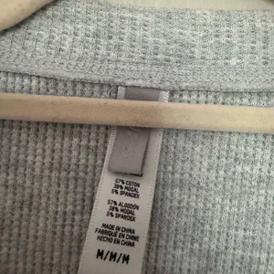 SKIMS Heather Gray Button-Up Crop Sweatshirt thumbnail 2