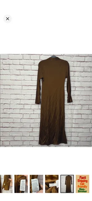 Madewell Satin Button-Front Midi Shirtdress in Cedar Like New Size 00. Satin smooth. Beautiful buttons down the front. No stretch. 50” long 14” bust From the website: Coming in a shiny satin woven with eco-friendly Lenzing™ Ecovero™ viscose fibers, this pretty midi is our modern take on the retro shirtdress. Featuring a point collar, long sleeves and buttons all down the front, it's perfect to pair with tall boots. Body-skimming fit. Length from high point of shoulder: 52" (based on size 6). 57% polyester/43% Lenzing™ Ecovero™ viscose. Do Well: Made of Lenzing™ Ecovero™, a sustainable fabric created with natural fibers and a more eco-friendly process. Machine wash. Imported. Item NO175 thumbnail 11