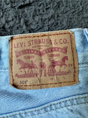 Levi’s 501 denim light wash shorts with distressing, size 29 thumbnail 4