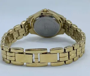 Armitron 27mm ladies Quartz analog WR watch gold tone MOP dial 6.5”-7” thumbnail 4