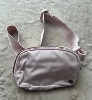 Lululemon Crossbody Belt Bag In Light Pink With Adjustable Strap & Zipper Closur thumbnail 1