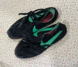 Nike Women's Black Sneakers with Green Swoosh thumbnail 1