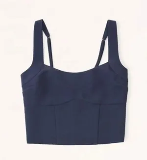 Abercrombie Stylish navy tank top. Features adjustable straps. Perfect for casual wear. Top is ticketed as medium but runs like an XL thumbnail 2