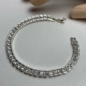 Faceted rhinestone silver tone bracelet thumbnail 1