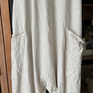 FP Movement Hot Shot Onesie jumpsuit beige ecru pockets zipper free people thumbnail 6