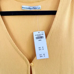 Abercrombie | NWT Triple‎ Keyhole Knit Mini Dress in Yellow Size Large thumbnail 7