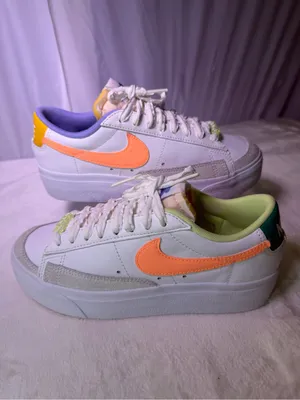 Nike Women’s White Sneakers with Peach Swoosh and Lavender Detail thumbnail 2