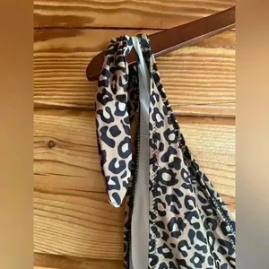NWOT cheetah one piece​​​​ Size L thumbnail 3