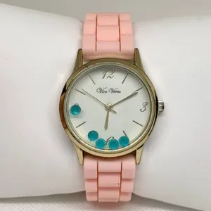 Vice Versa women Floating blue Stones Watch gold toned 30mm quartz pink running thumbnail 1