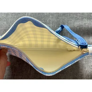 light blue and white gingham patterned IPSY Glam Bag wristlet pouch.‎ thumbnail 2