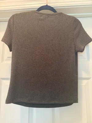 Soft ribbed knit short sleeve top. Crew neckline with fitted silhouette. thumbnail 2