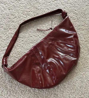 Croissant shaped crossbody bag thumbnail 1
