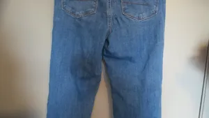 American Eagle Outfitters next level stretch super hi-rise flare jeans in medium wash blue size 4. thumbnail 11