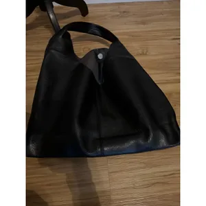 Black slouchy vegan leather shoulder bag with an unstructured, triangular hobo d thumbnail 2
