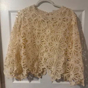 Cream lace blouse with floral and circular motifs #lace #floral thumbnail 1