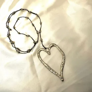 Silver tone long open heart necklace thumbnail 5