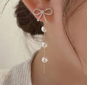 Hollow Bow Shiny Zircon Dangle Earrings thumbnail 1