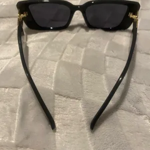 Sunglasses Bllack With Gold Trim.. Worn once thumbnail 5