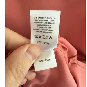 FIGS Women's Casma Three-Pocket Scrub Top In Coral Size XS/P thumbnail 7